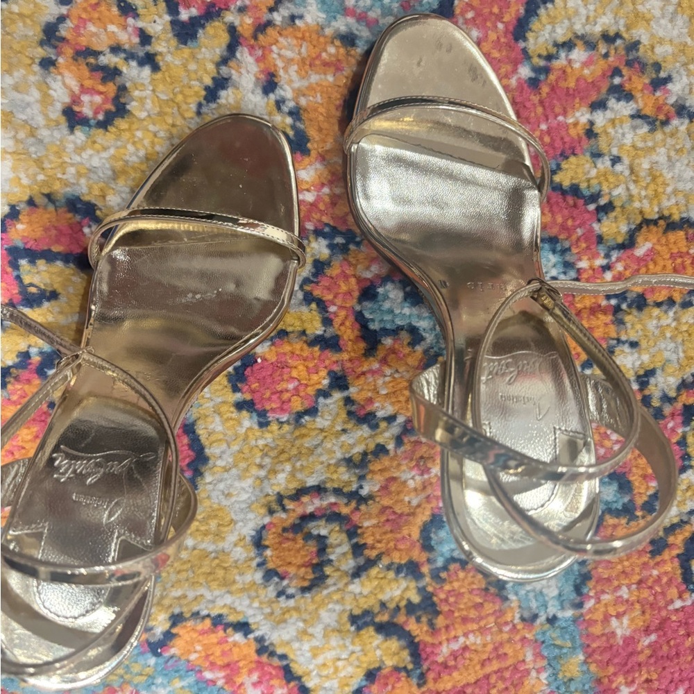 Christian Louboutin Metallic Gold Heels never worn